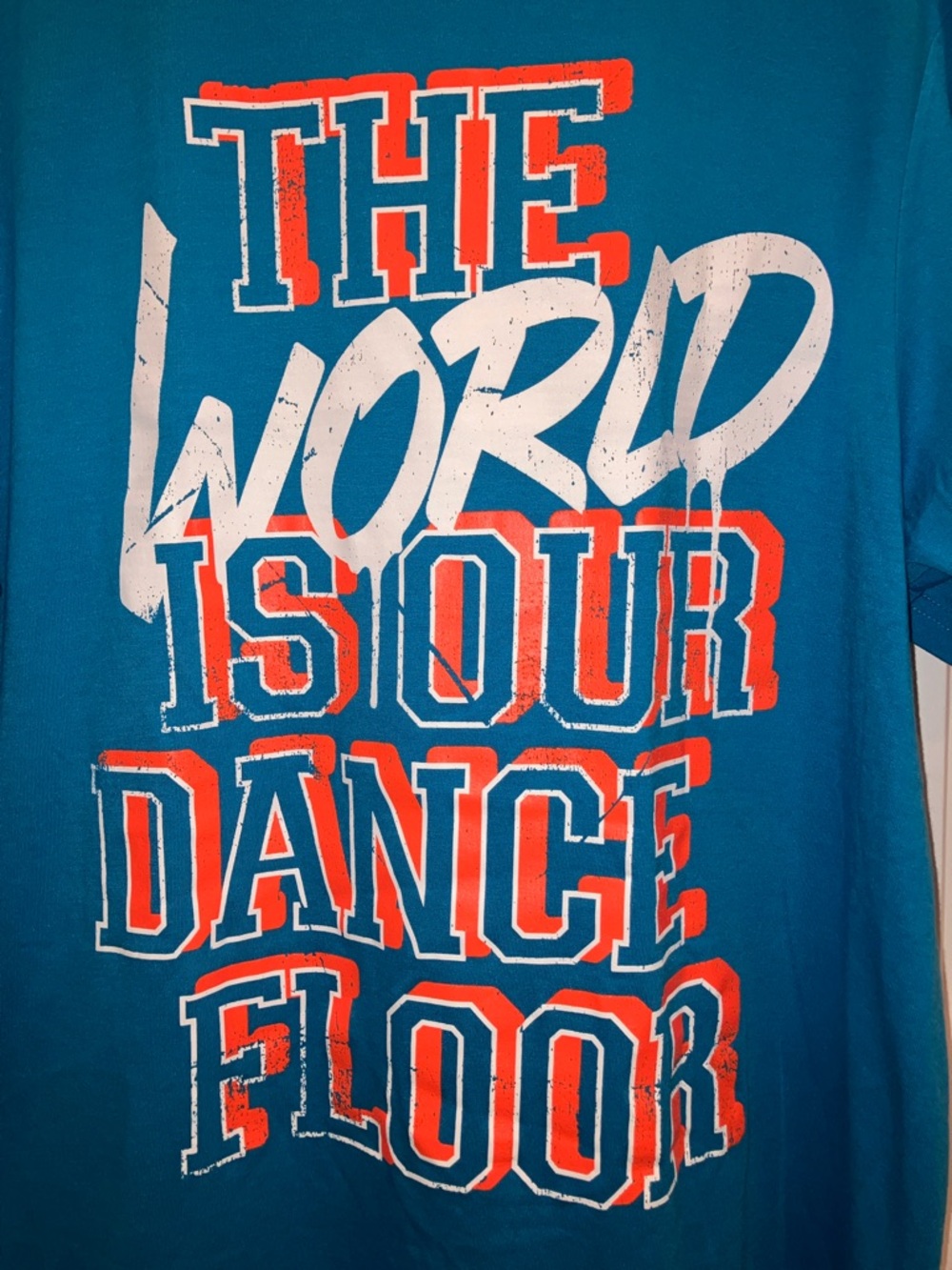 NWOT Zumba/Dance/Workout Tee  - "The World Is Our Dance Floor"